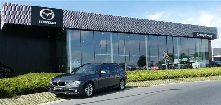 Bmw 318D break in automaat tweedehands kopen bij Garage Dochy Izegem Mooie break BMW 318D tweedehands automaat kopen bij Garage Dochy Izegem
