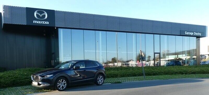 Mazda CX30 SUV tweedehands directiewagen kopen bij Garage Dochy Izegem in deep crystal blue metaalkleur Tweedehands directiewagen Mazda CX-30 kopen bij Garage Dochy Izegem