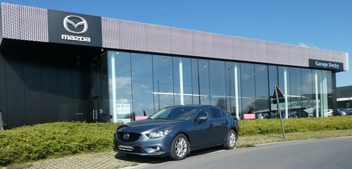 Mazda 6 berline in benzine tweedehands kopen met garantie bij Garage Dochy Izegem Mooie berline Blue Reflex tweedehands met garantie kopen bij Garage Dochy Izegem