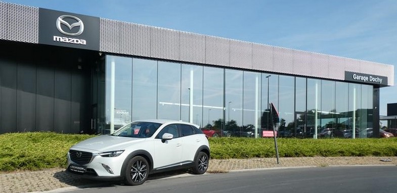 Mazda CX-3 SUV tweedehands benzine kopen bij Garage Dochy Izegem in Skycruise Ceramic White Mazda CX3 SUV tweedehands kopen in benzine bij Garage Dochy Izegem