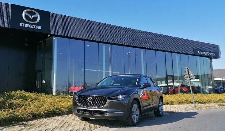 Mazda CX-30 Machine Grey Hakone stockwagen kopen met lente korting bij Garage Dochy Izegem Mazda CX-30 machine grey benzine stockwagen in Hakone met stock voordeel