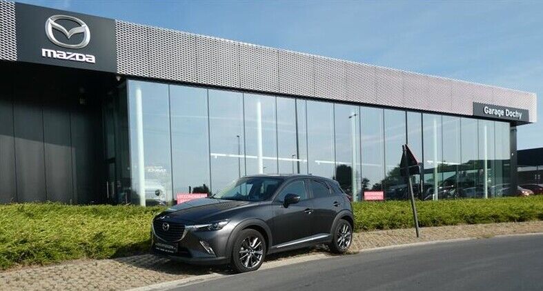 Tweedehands Mazda CX3 SUV benzine kopen met garantie bij Garage Dochy Izegem Mooie Mazda CX3 benzine Machine Grey Ginza kopen bij Garage Dochy Izegem