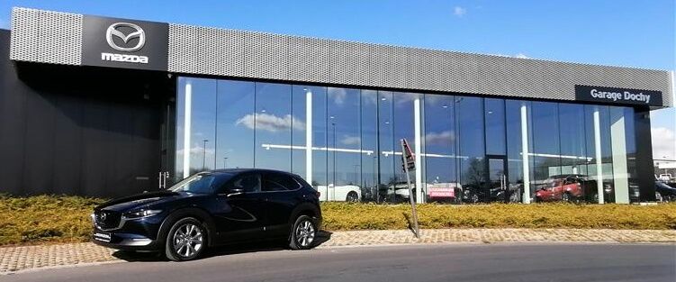 Mazda CX-30 Skyactiv X benzine demowagen kopen met extra korting bij Garage Dochy Izegem Demonstratiekorting op de Mazda CX-30 Skyactiv X deep crystal blue bij Garage Dochy Izegem