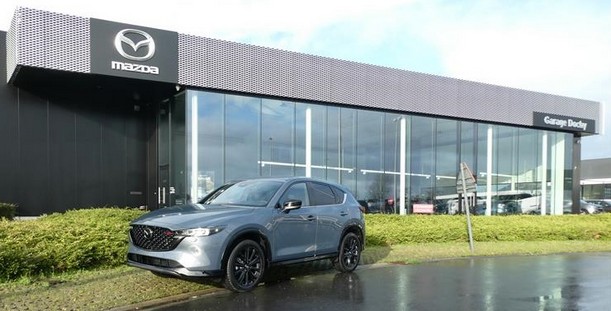 Mazda CX-5 Polymetal Grey stockwagen Homura automaat kopen met salonkorting bij Garage Dochy Izegem Mooie Mazda CX5 Homura Polymetal Grey stockwagen met salonkorting 2023 kopen bij Garage Dochy Izegem