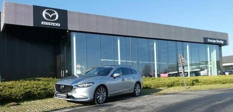 Mooie break Mazda 6 met automatische versnelilngen tweedehands sonic silver kopen bij Garage Dochy Izegem