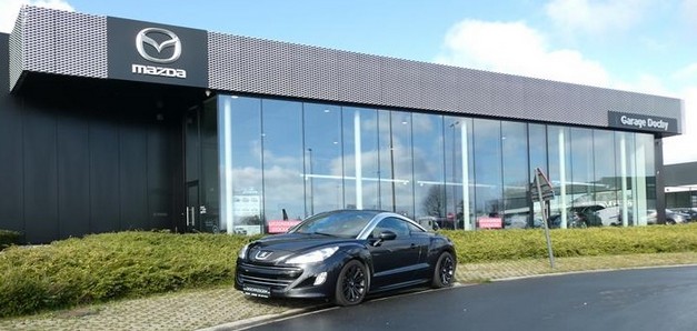 Sportieve Peugeot RCZ coupé tweedehands benzine kopen met garantie bij Garage Dochy Izegem Mooie en goed verzorgde Peugeot RCZ tweedehands Coupé kopen bij Garage Dochy Izegem